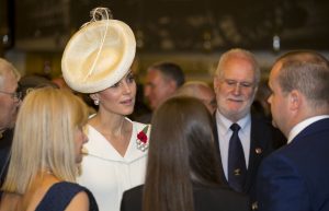 Image shows the HRH The Duchess of Cambridge inside the Cloth Hall. HRH The Duke and Duchess of Cambridge joined military leaders, senior politicians and Royals in Belgium to mark the centenary anniversary of the beginning of the Battle of Passchendaele, the Third Battle of Ypres. The battle in Flanders began on 31 July 1971 and was a major engagement in the First World War, claiming the lives of around 275,000 British and Commonwealth Military personnel and around 200,000 German lives.   Sir Michael Fallon joined Prime Minister Theresa May, the Duke and Duchess of Cambridge, The King and Queen of Belgium and other dignitaries for the playing of the Last Post ceremony at the Menin Gate in Ypres, Belgium.  Music and readings were added to the traditional nightly service which has happened for over 90 years.A Sunset Ceremony took place at the Cloth Hall, Ypres after the ceremony at Menin Gate. Light was projected onto the Cloth Hall in the Market Square providing the backdrop to an evening of storytelling and music about the experience of soldiers during four years of war on the Ypres Salient. The UK Government, in collaboration with the Belgian Government, the Commonwealth War Graves Commission, and the Royal British Legion are hosting a series of events to mark one of the defining battles of the First World War. The Chief of the Defence Staff, Joint Force Commander and heads of the Royal Navy, British Army and Royal Air Force are in Belgium, where visitors will to pay their respects at Tyne Cot cemetery near the village of Passchendaele. It is the largest Commonwealth War Grave in the world.   Members of the UK Armed Forces took part in the event with the Pipes and Drums of the Royal Irish Regiment and The Band of the Welsh Guards providing music. The Menin Gate is one of four memorials to the missing which covers the area known as the Ypres Salient. The site of the Menin Gate was chosen because of the hundreds of thousands of men who passed through it